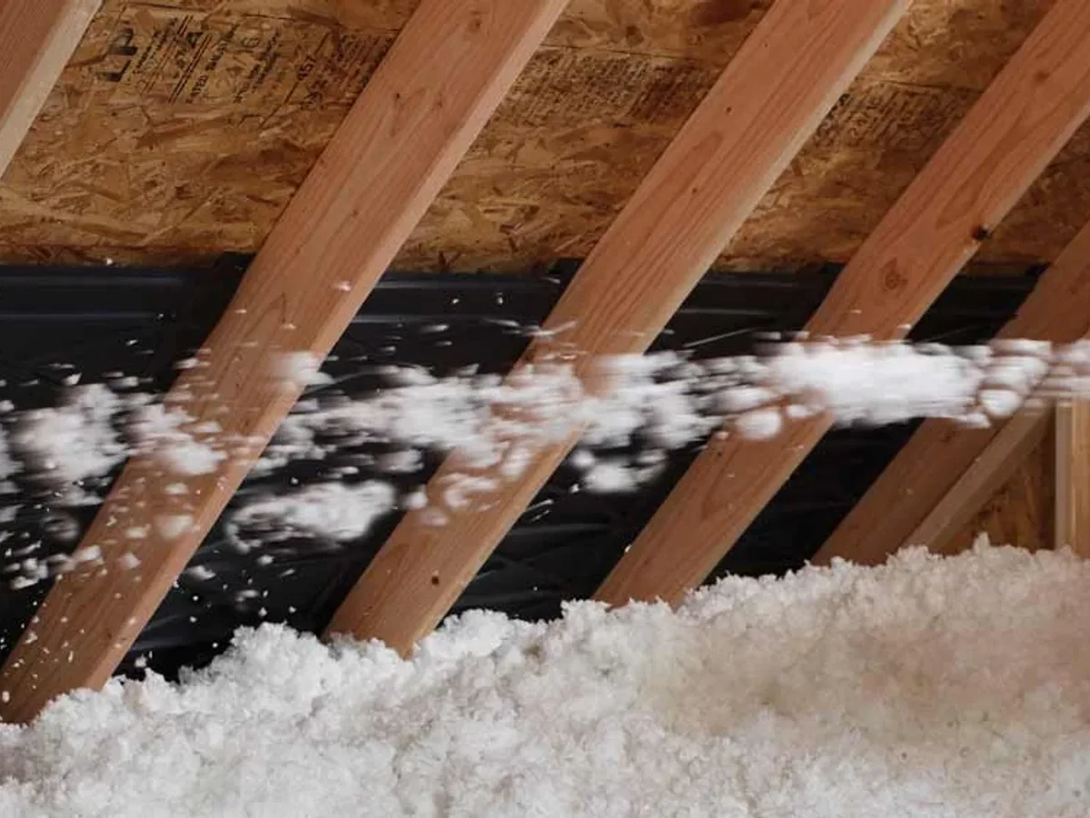 Blowing loose-fill insulation between attic joists — Ed Residential LLC, Trappe, MD